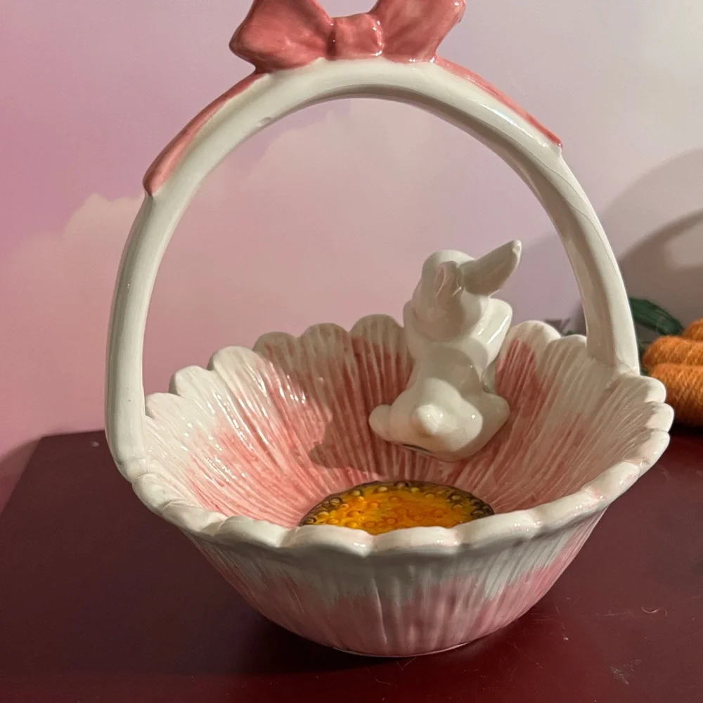 Vintage Ceramic bunny basket with a pink bow and floral motif